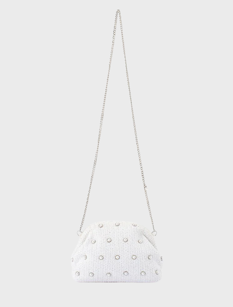 A sleek white clutch bag with silver studs, combining sophistication and contemporary style.