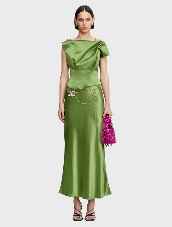 A green satin dress featuring a bow on the shoulder, elegantly draping and showcasing a stylish design.