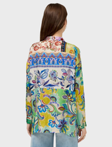 Audrey Tunic in Armeria Patchwork, highlighting a vibrant mix of fabrics and colors for a fashionable, modern appearance.