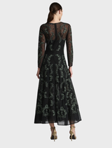 Chic A-line dress featuring emerald and black colors, designed to provide a flattering fit for various occasions.