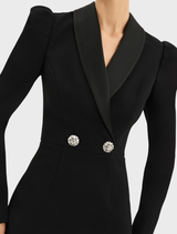 Stunning black Symphony gown with a refined style, featuring a fitted top and a full, flowing skirt.