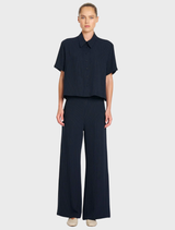 Classic collar crop shirt in navy and chalk stripes, designed with a button front and made from Mela Purdie's Flex Weave.