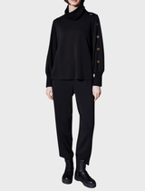 Supersoft black barrel trousers, featuring a relaxed fit and comfortable fabric for casual or stylish wear.