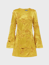 A stylish mini dress featuring embellished bell sleeves, showcasing an opulent design perfect for elegant occasions.