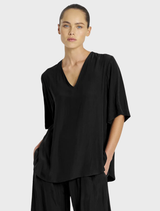 Black Swish Plaza top featuring a sleek design, suitable for casual or formal wear.