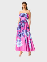 Floral print maxi gown in pink and blue, showcasing a strapless design, ruffle details, and a comfortable fit for special occasions.