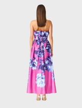 Strapless blue and pink floral maxi gown with ruffle detail, designed for elegant events and special occasions.