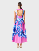 A blue and pink floral midi dress with a boat neckline, cap sleeves, and a fit-and-flare skirt, ideal for spring events.
