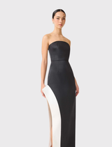 Black-and-white asymmetrical gown by Elliatt, designed for elegant evening wear with a sleek silhouette and minimal accessories.
