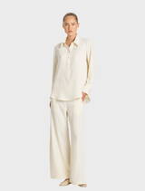 Stylish tab shirt in vanilla and black, ideal for enhancing any wardrobe with a chic touch.