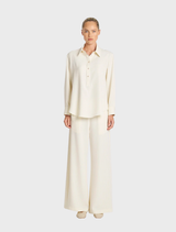 Tab shirt in vanilla and black, featuring a stylish design suitable for casual or formal occasions.