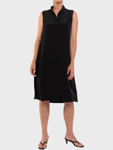 Black Tab Slide Dress featuring a sleek design and elegant silhouette, perfect for various occasions.