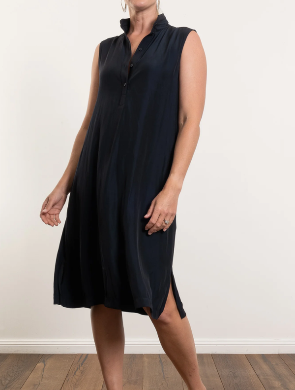 Navy Tab Slide Dress featuring a sleek design and elegant silhouette, perfect for various occasions.