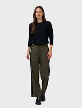 Display of khaki tactical pants, emphasizing their practical design and durable fabric for outdoor and tactical purposes.