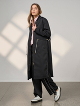 Black tactical coat featuring multiple pockets and a durable design for outdoor and military use.