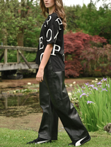 Black Lock, Stock & Barrel pants featured on a neutral backdrop, emphasizing their contemporary style and fit.