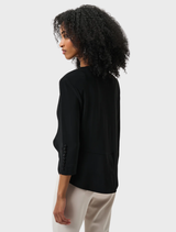 Timeless black tuxedo overpiece, designed for sophistication at formal occasions.
