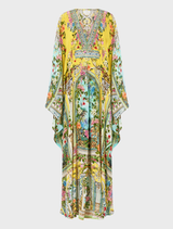 Elegant long kaftan with a defined waist detail, reflecting the luxurious style of the Tales of Topkapi Palace.