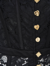 Taurus Rising dress showcases a corset waist and long sleeves, elegantly designed with lace, inspired by Spanish fashion.