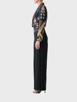 Slim fit cropped jacket made of silk-wool, featuring dramatic tailoring and inspired by the embroidery of traditional matador outfits.