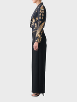 Tailored pant in silk-wool with waist button detail, high-waisted silhouette inspired by traditional matador attire.