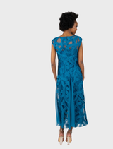 Teal V-neck cocktail dress with a godet skirt, offering a chic and sophisticated look for formal gatherings.