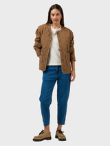 Mocha Tetris jacket adorned with a vibrant block pattern, combining comfort and a fun, retro aesthetic.