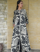 Vintage-inspired black dress with a timeless design, suitable for formal occasions and chic gatherings.