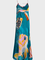 The Long Game Dress features a whimsical multi-fish pattern, perfect for a cheerful and relaxed summer look.