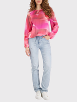 Pink floral-patterned Monari blouse with a round neckline, long sleeves, and elastic details for a comfortable fit.