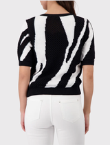 Black intarsia sweater with a tiger motif, crafted from 100% cotton, featuring ajour knit, short sleeves, and round neckline.
