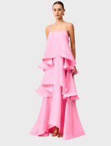 A delicate pink dress made of silk chiffon, emphasizing its soft texture and graceful silhouette.
