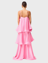  A soft pink dress in silk chiffon, illustrating its elegant drape and lightweight feel.