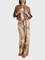 Stylish cropped trench jacket in mocca, featuring a stand-up collar, snap button placket, and intricately designed sleeve hems.