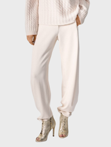 Vanilla barrel trousers displayed on a white background, featuring a relaxed fit and tapered leg design.