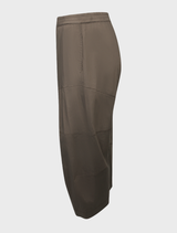Hide cropped Tuscan pants arranged neatly, illustrating a fashionable design that complements various wardrobe styles.