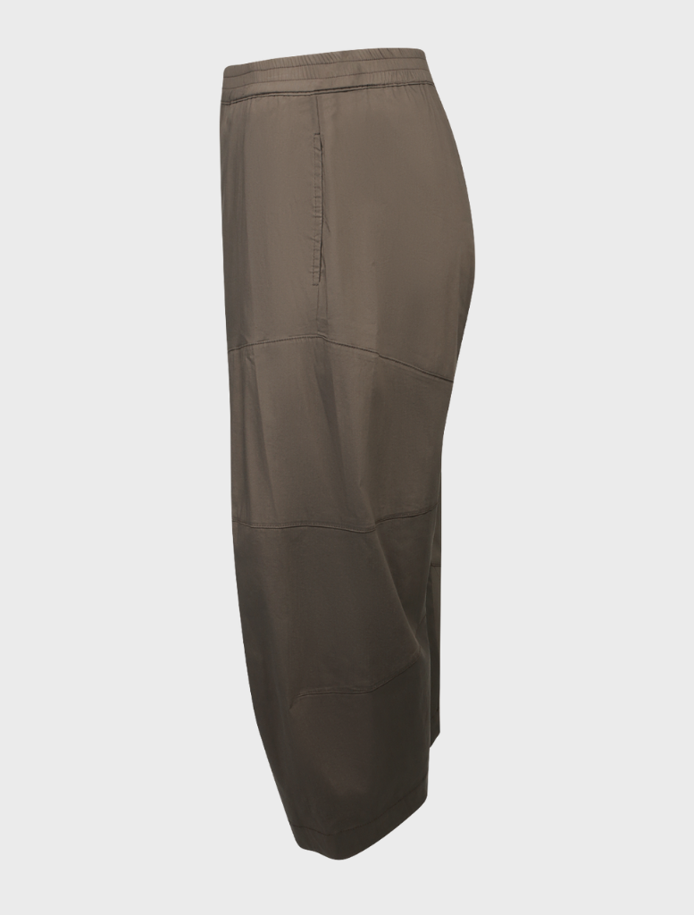 Hide cropped Tuscan pants arranged neatly, illustrating a fashionable design that complements various wardrobe styles.