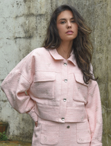 Pink Tweedle Bow Jacket featuring a stylish bow detail, perfect for adding a playful touch to any outfit.