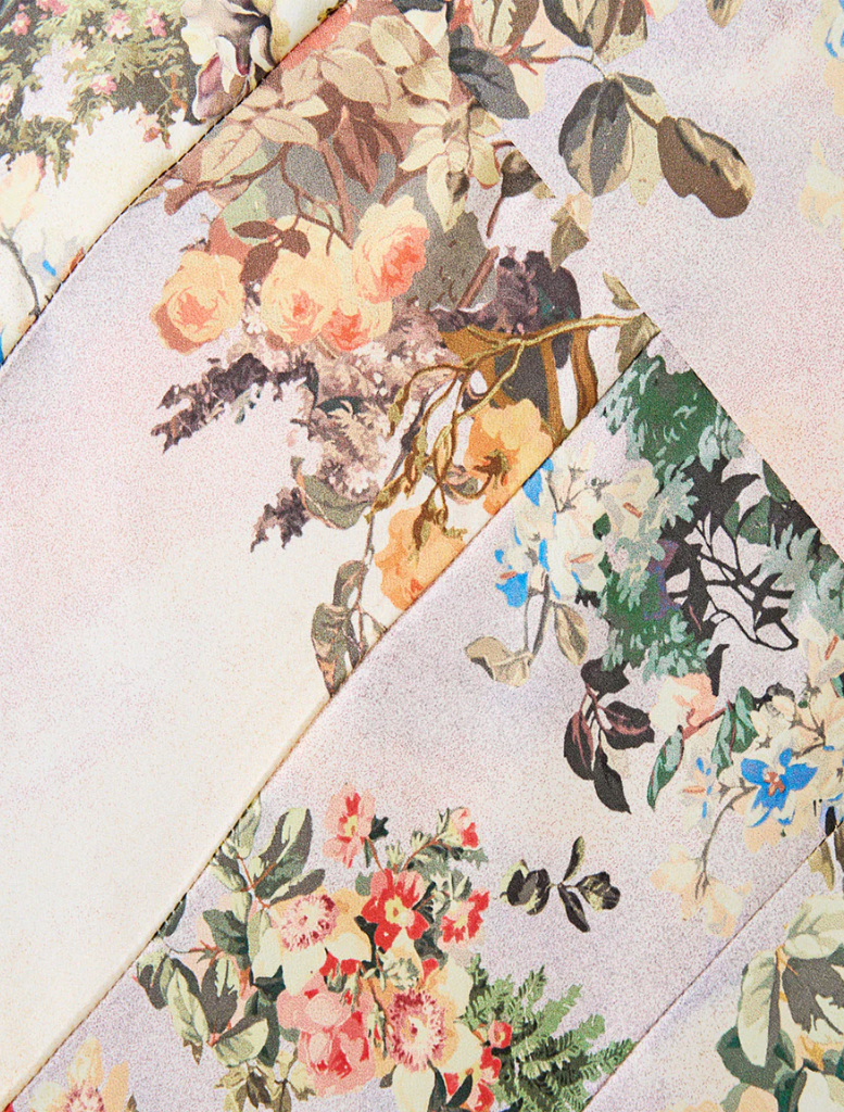 Twilista's Lace Splice One Shoulder Dress, showcasing a white fabric adorned with a colorful floral print.