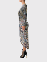 A fashionable twist front dress in an Istanbul Animalia print, combining bold patterns with a modern silhouette.
