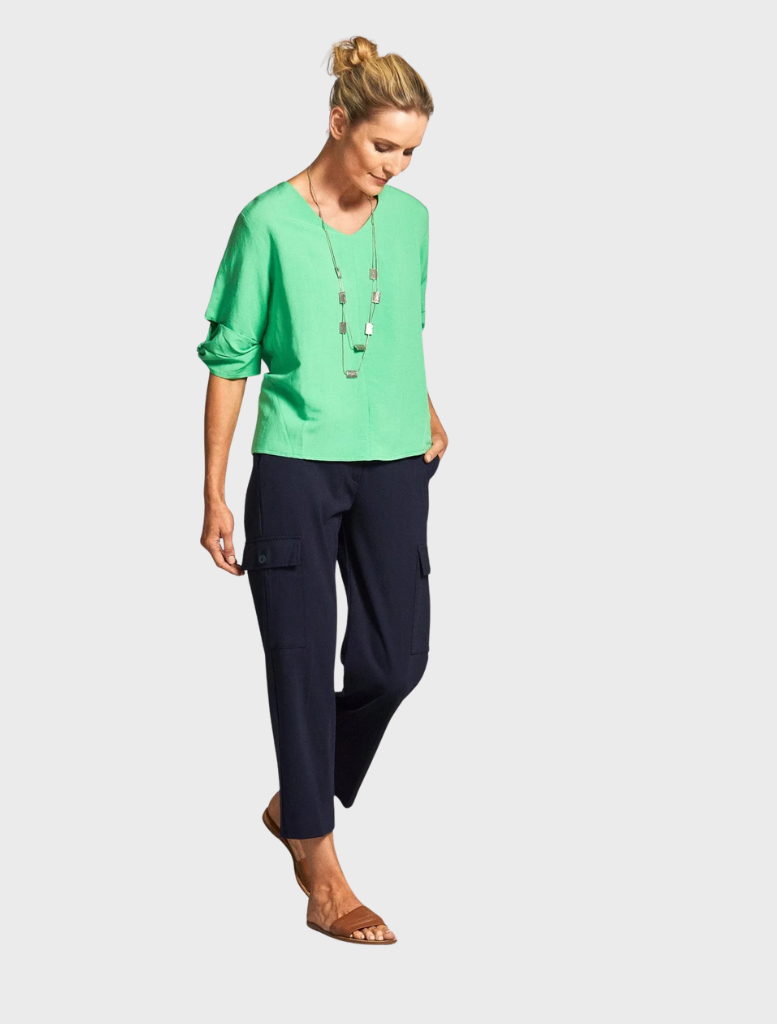 A green short-sleeve top designed for comfort and style in casual settings.