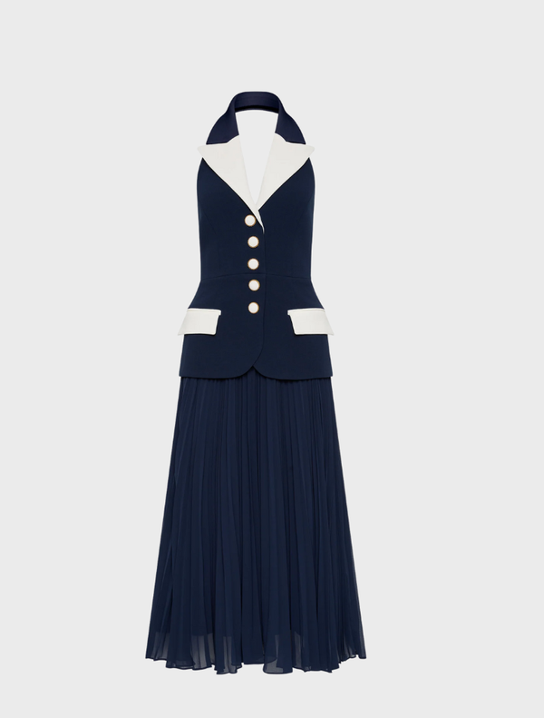 Navy Ula Midi Dress featuring a white collar, paired with a stylish white jacket.
