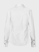  White Ullismd shirt draped on a mannequin, emphasizing its fit and style.