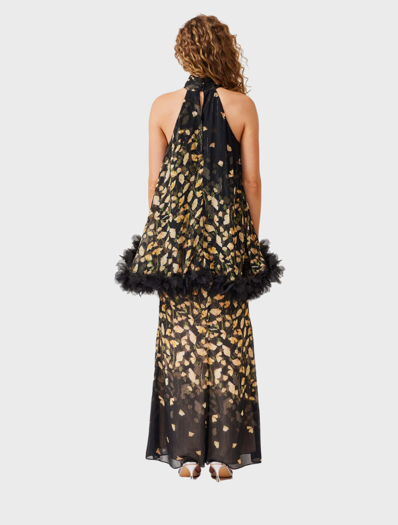 A chic black and gold dress highlighted by a floral print, suitable for various occasions.