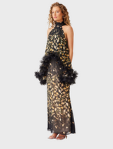 Black and gold dress with a beautiful floral pattern, combining sophistication and charm.