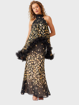 A stylish black and gold dress adorned with a vibrant floral print, ideal for special events.