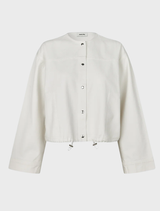 Elegant short jacket in vanilla cream by Princessmd, perfect for adding a chic touch to any outfit.