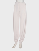 Vanilla barrel trousers on a neutral backdrop, emphasizing their contemporary design and relaxed style.
