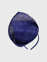 Elegant cobalt blue fascinator with intricate ribbon detailing, designed for a secure fit on a minimalist headband.