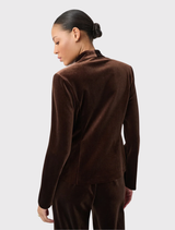 Mahogany bonded velvet blazer with a fitted silhouette, long sleeves, stand collar, and two-button closure; unlined.